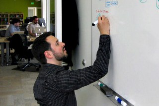 rand-writing-on-whiteboard